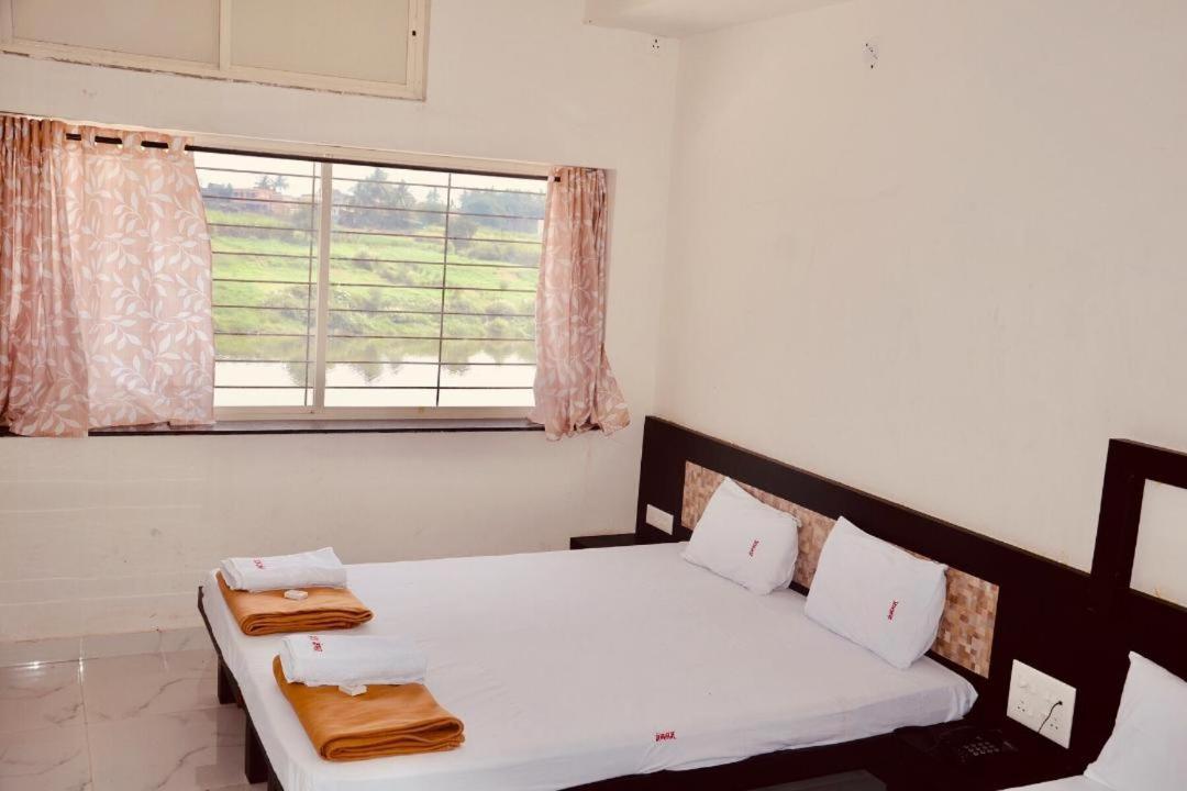 Hotel Mangalam Kurandvad Buitenkant foto